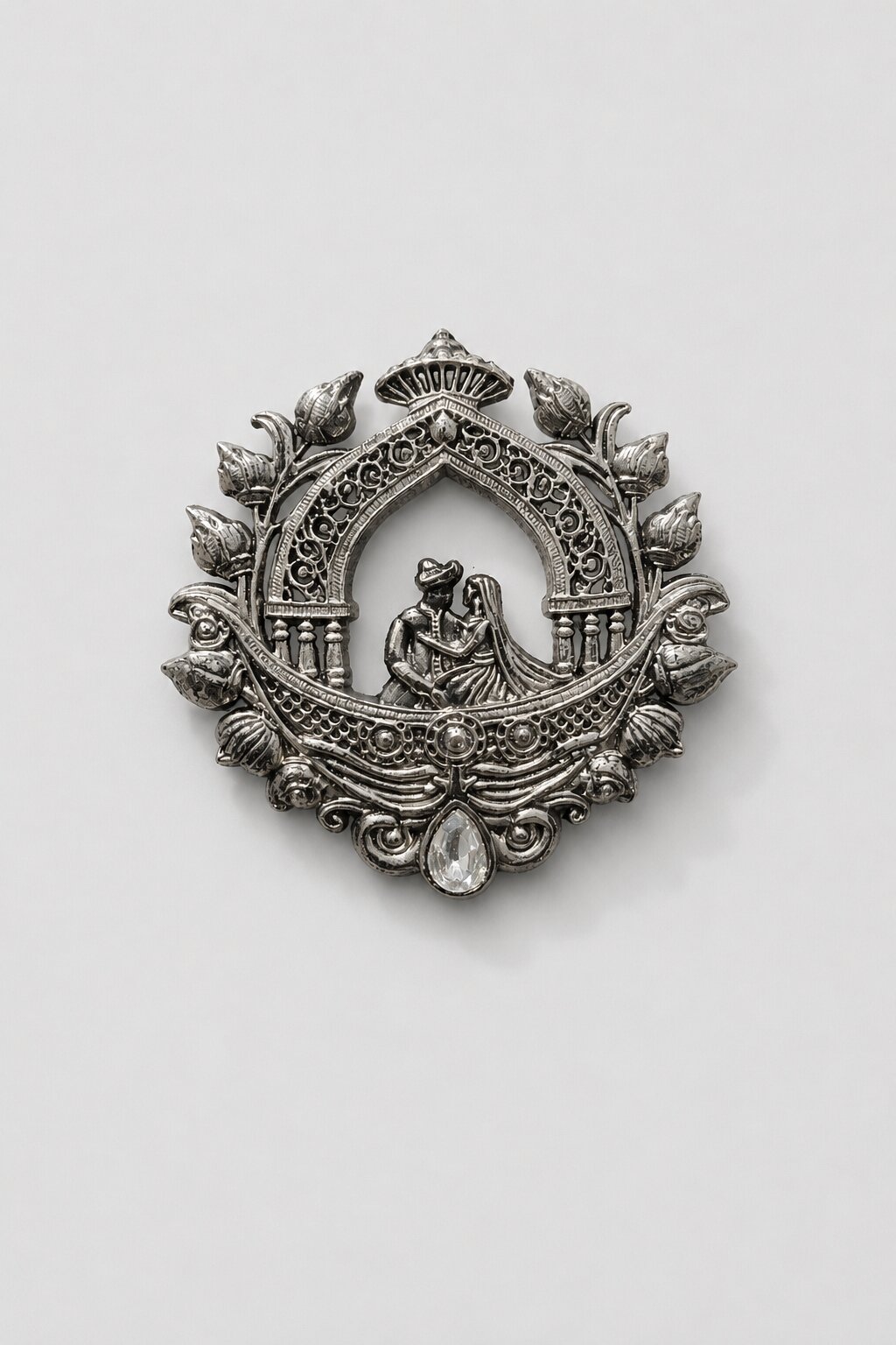 Royal Wedding Couple Silver Brooch in antique silver finish featuring a traditional bride and groom beneath an ornate heritage arch with floral motifs and a crystal accent.