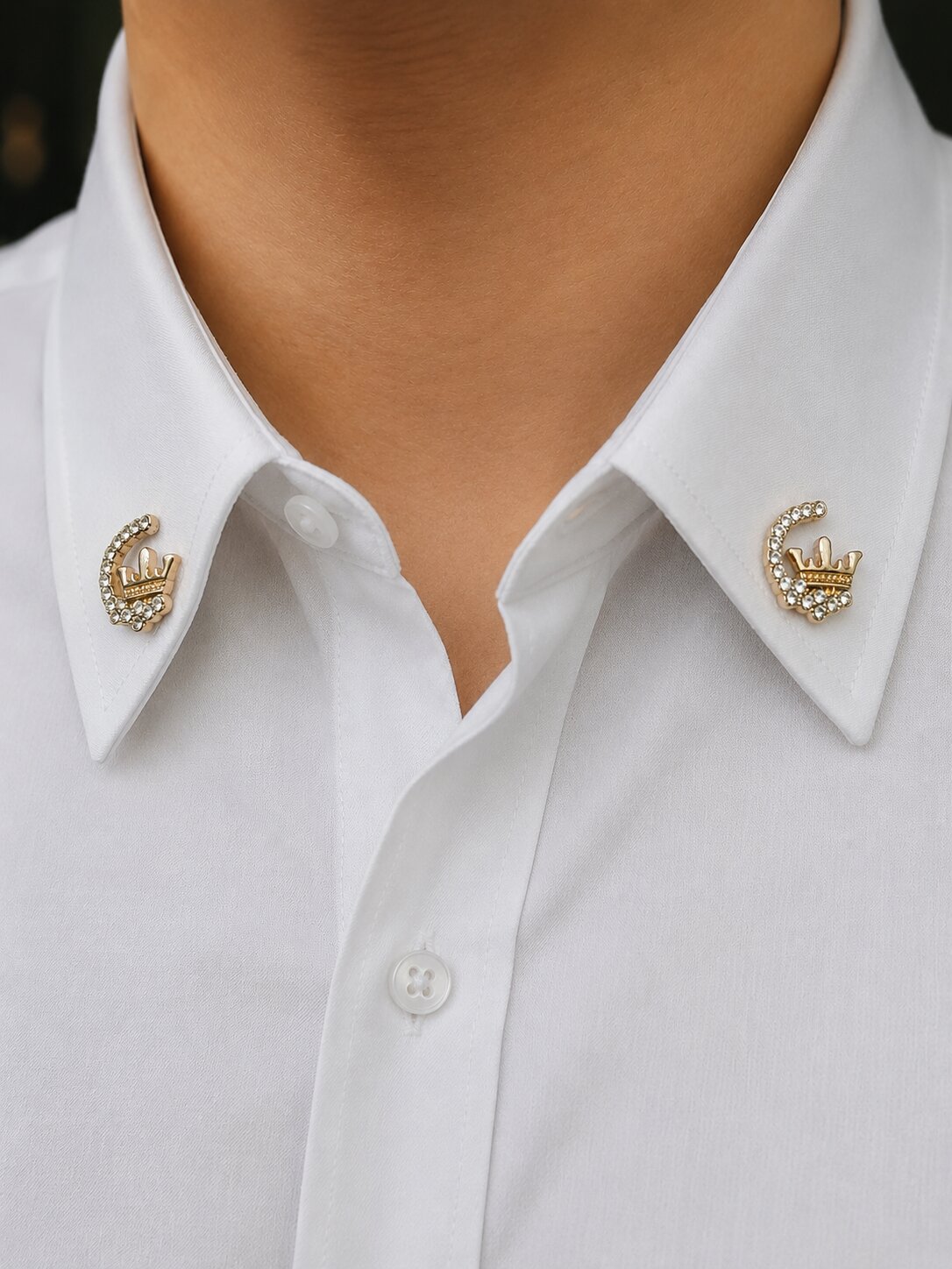 Gold crescent crown brooch with sparkling crystal embellishments and premium finish.