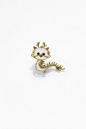 Cute Deer brooch with white enamel face, gold-tone body, black eyes, red accents, and whimsical design.