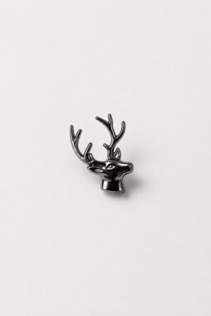 Black metallic stag head brooch with detailed antlers and polished finish.