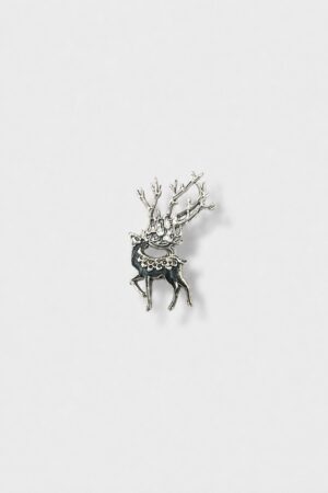 Silver-tone deer brooch with detailed antlers and elegant metallic finish.