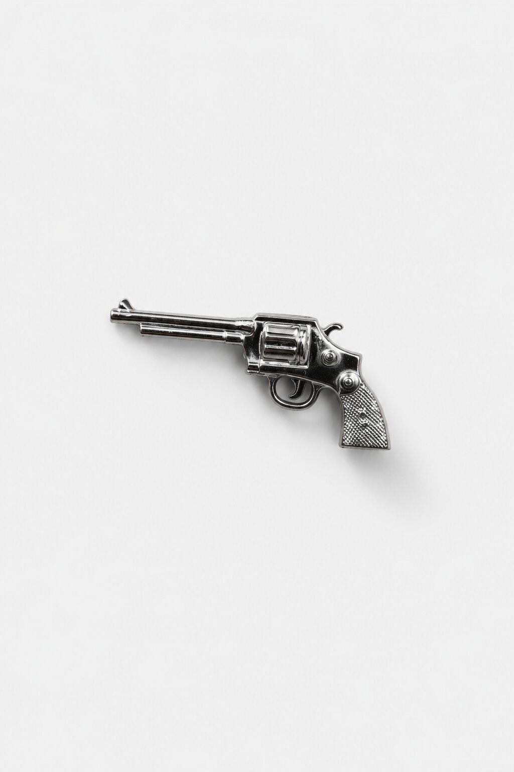 Silver revolver-shaped collar tip accessory crafted from premium stainless steel alloy with polished finish.