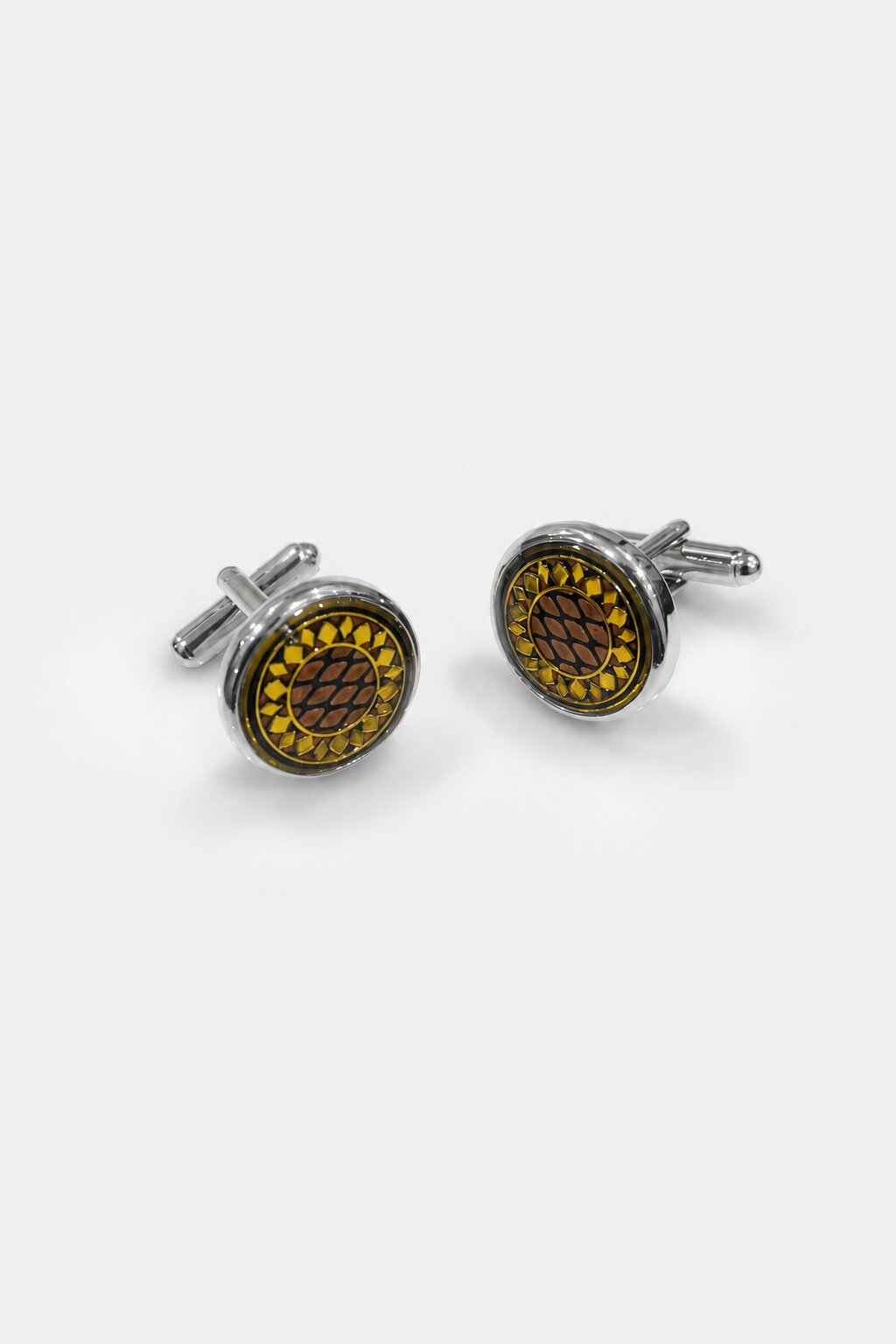 Silver round cufflinks with sunflower-inspired yellow and brown decorative pattern for men's formal shirts.