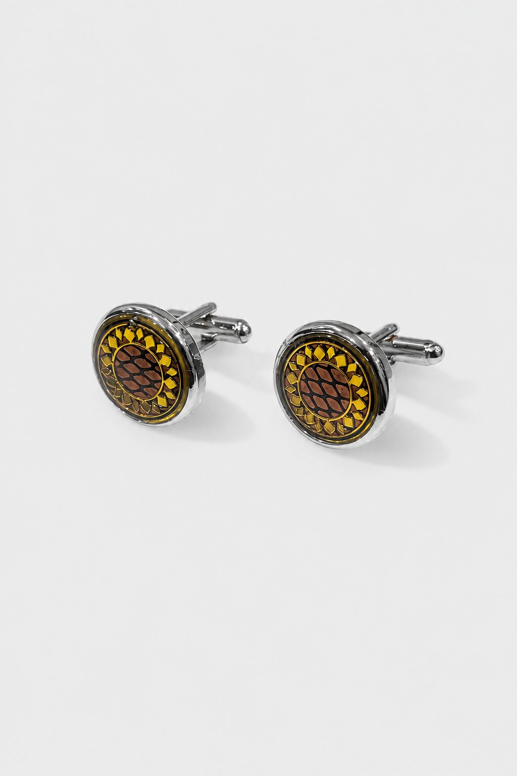 Silver round cufflinks with sunflower-inspired yellow and brown decorative pattern for men's formal shirts.