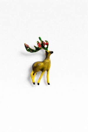 Cute dragon brooch with white enamel face, gold-tone body, black eyes, red accents, and whimsical design.