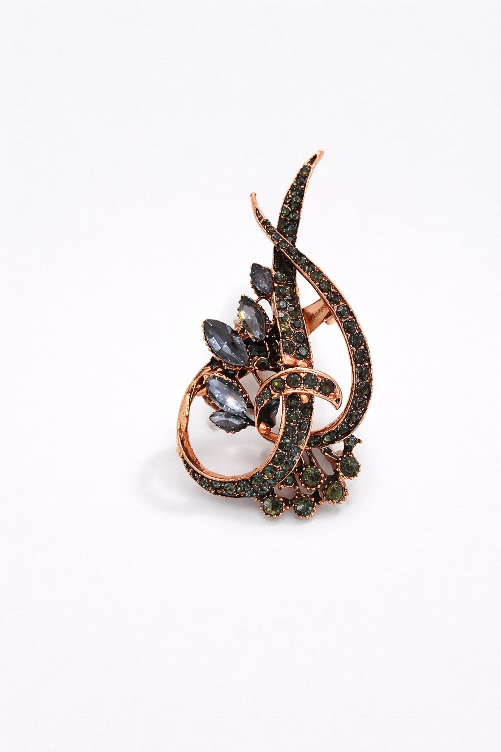 Rose gold floral crystal brooch with black marquise-cut stones, green crystal accents, and an elegant swirl design.