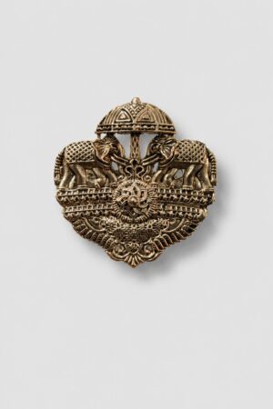 Antique gold twin elephant heritage brooch featuring two ornate elephants beneath a ceremonial canopy with intricate traditional detailing.